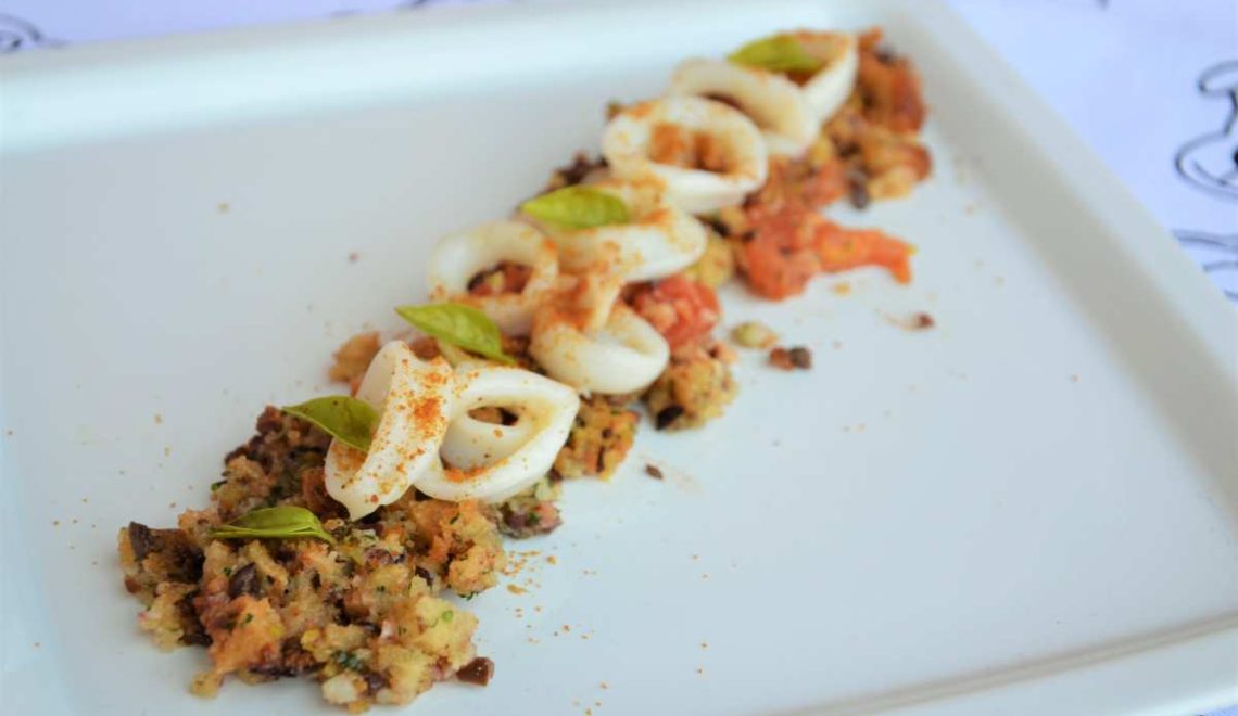 Calamari su letto di olive, bottarga e pecorino